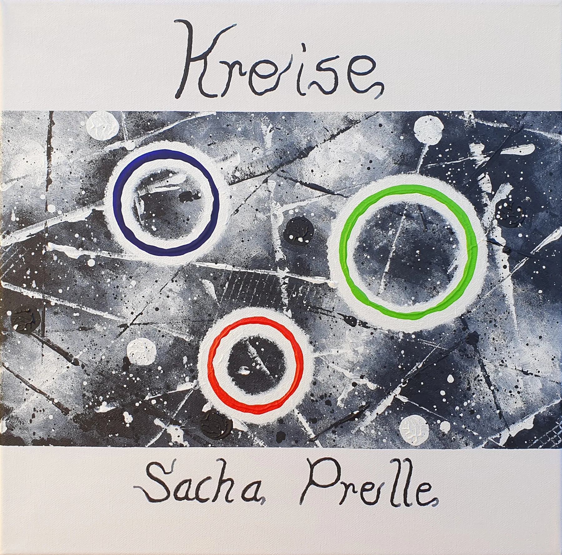 Acrylbild „Kreise – Titelbild“: drei gemalte Ringe in Blau, Grün und Rot auf schwarz-weiß gespritztem Grund